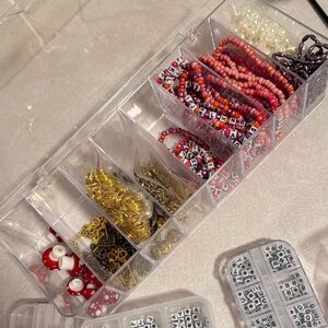 Bundle of Beads and jewelry findings in containers